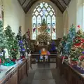 The choir and altar are full of Christmas trees, The Stowmarket Christmas Tree Festival and the GSB at Mellis - 20th December 2024