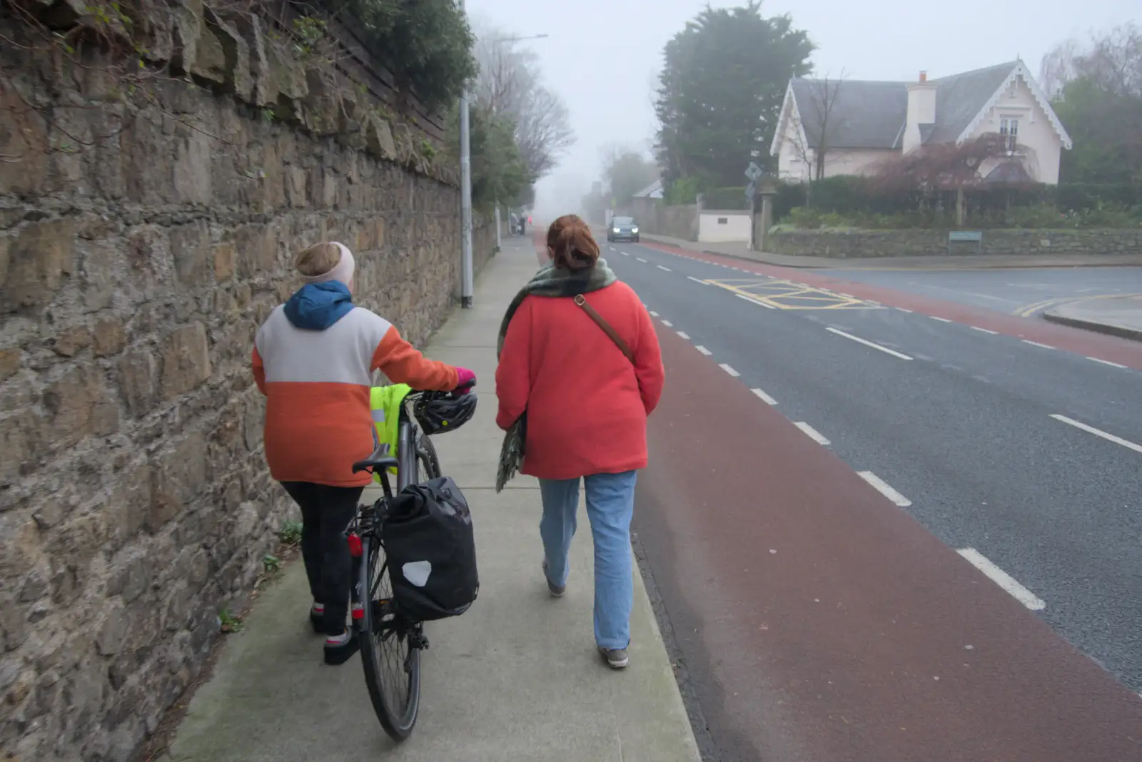 Meagan and Isobel walk down Monkstown Road, from St. Stephen's Day in Blackrock, County Dublin, Ireland - 26th December 2024