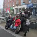 Isobel sits down in Blackrock, St. Stephen's Day in Blackrock, County Dublin, Ireland - 26th December 2024