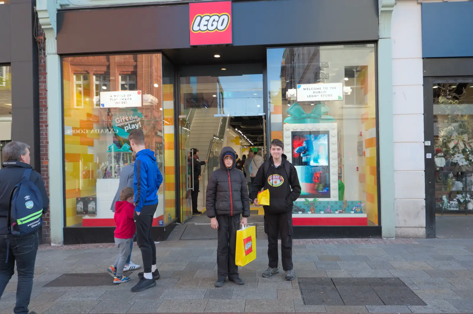 The boys with their purchases on Grafton Street, from St. Stephen's Day in Blackrock, County Dublin, Ireland - 26th December 2024