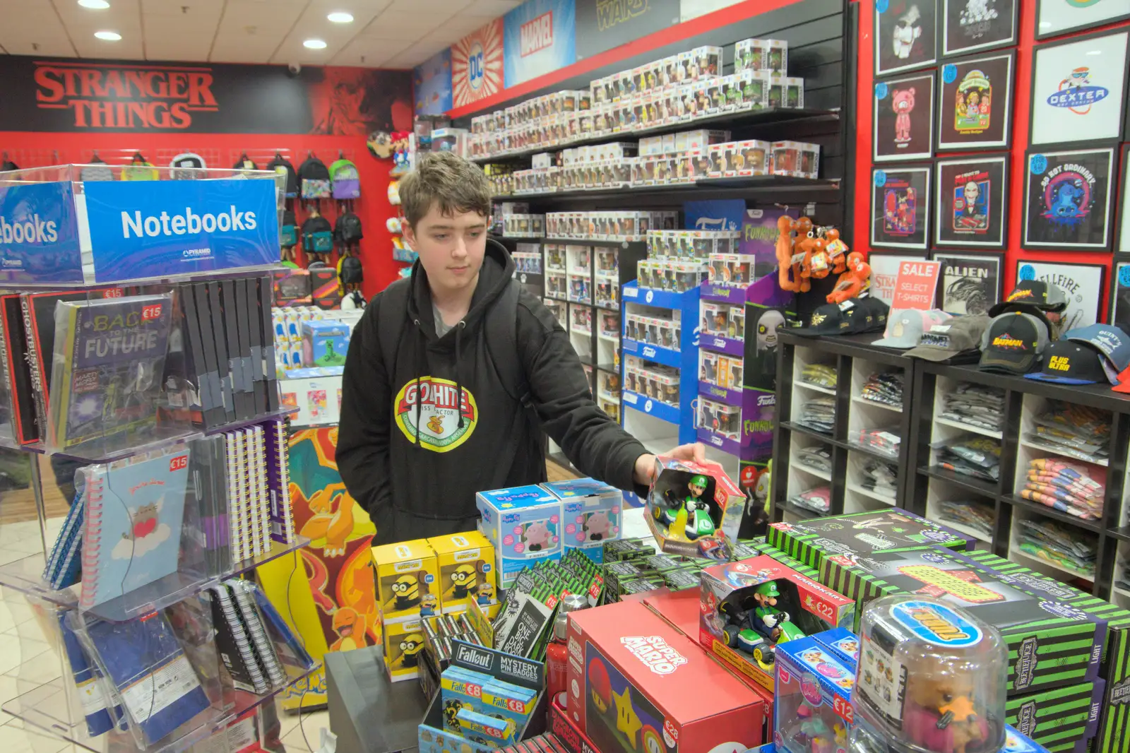 Fred checks stuff out in a record shop, from St. Stephen's Day in Blackrock, County Dublin, Ireland - 26th December 2024