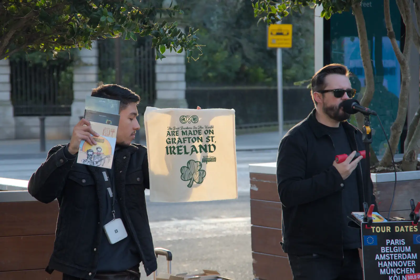 An assistant holds up some merchandise, from St. Stephen's Day in Blackrock, County Dublin, Ireland - 26th December 2024