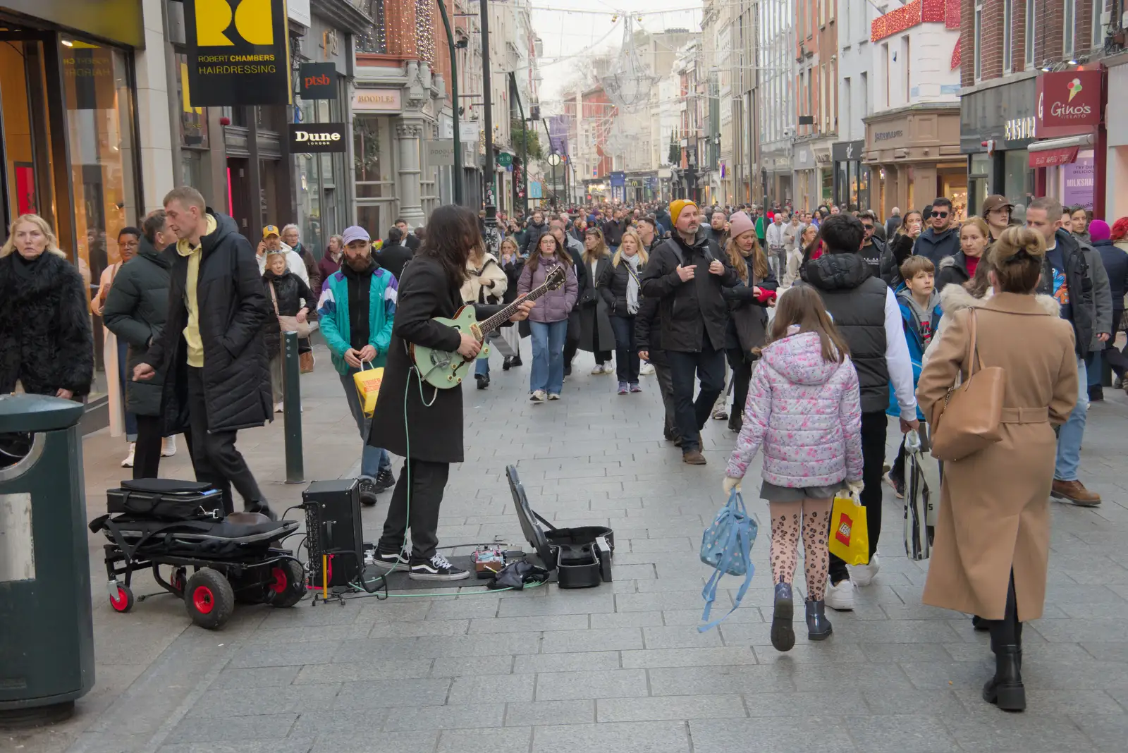 The guitar player has moved onto Grafton Street, from St. Stephen's Day in Blackrock, County Dublin, Ireland - 26th December 2024