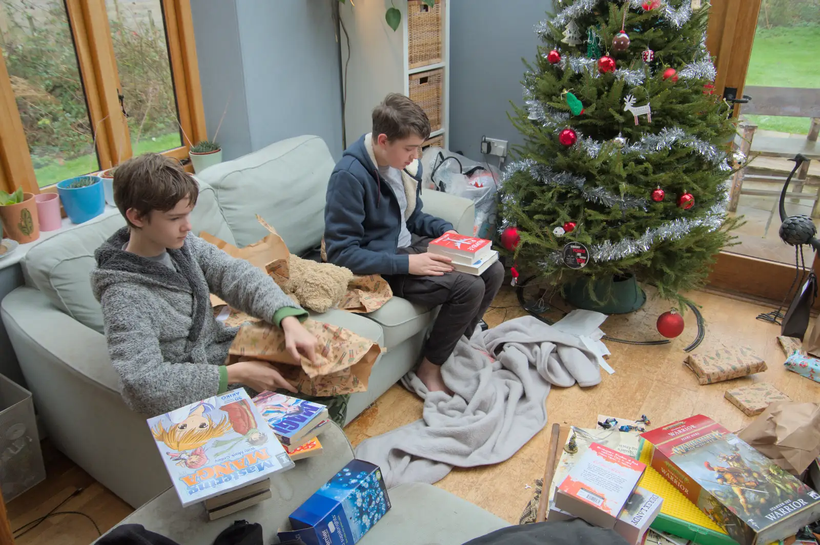 The boys catch up on present opening, from St. Stephen's Day in Blackrock, County Dublin, Ireland - 26th December 2024