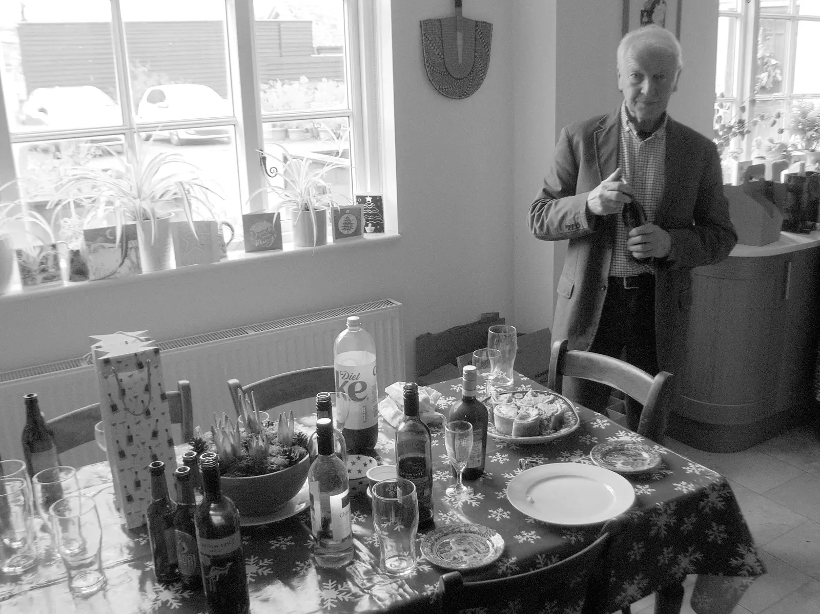 John gets a drink in the kitchen, from A New Year Miscellany, Brome, Suffolk - 1st January 2025