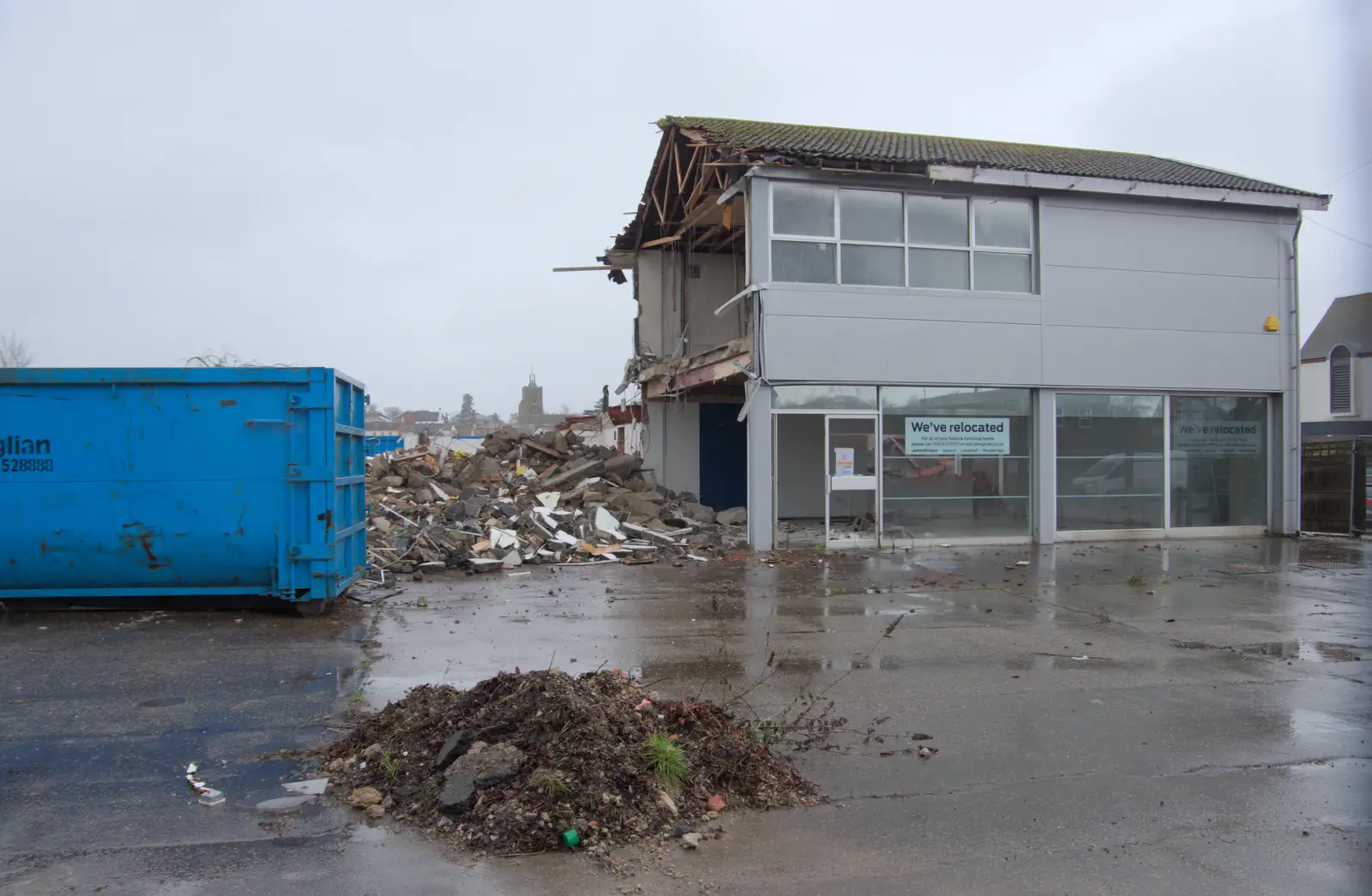 The church of St. Mary appears behind the rubble, from The Demolition of Park Road, Diss, Norfolk - 1st February 2025