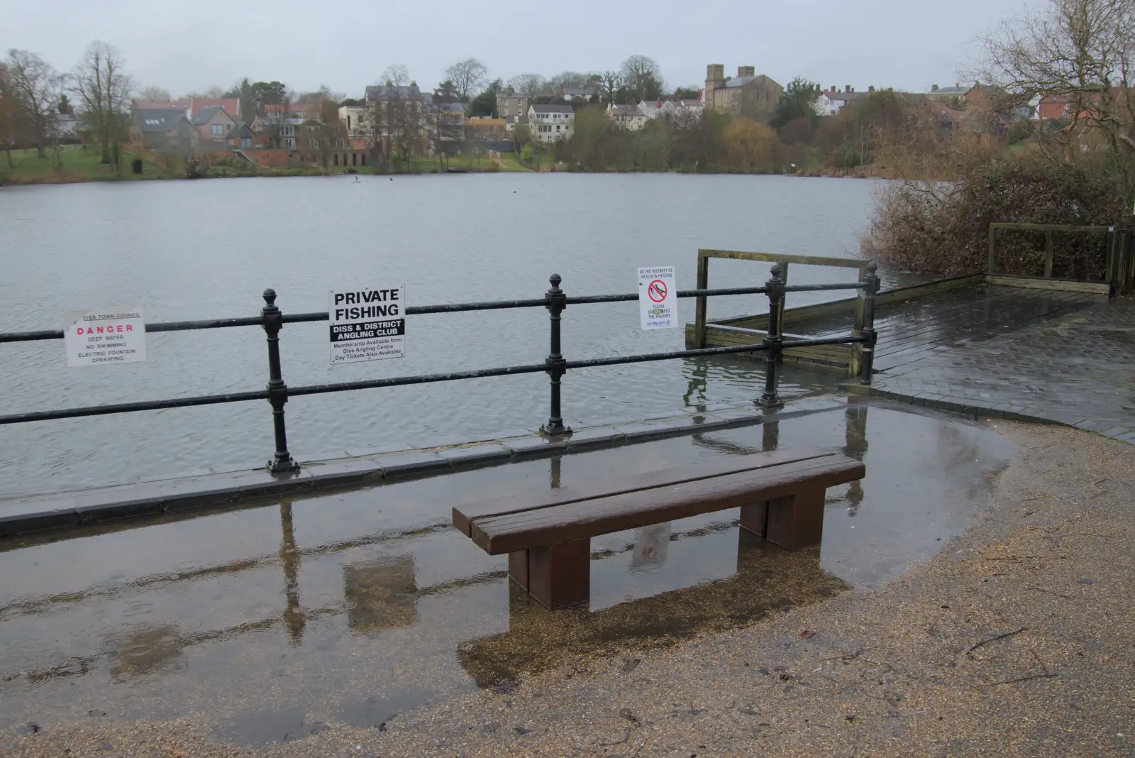 The Mere floods up to the benches, from The Demolition of Park Road, Diss, Norfolk - 1st February 2025