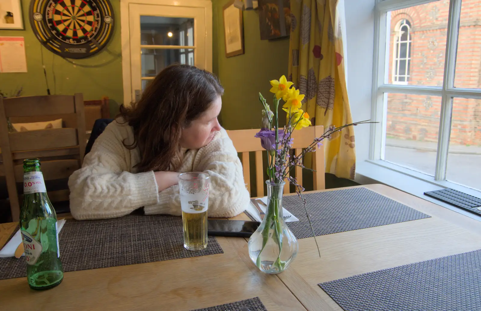 Isobel looks out of the window in the Queen's Head, from The Demolition of Park Road, Diss, Norfolk - 1st February 2025