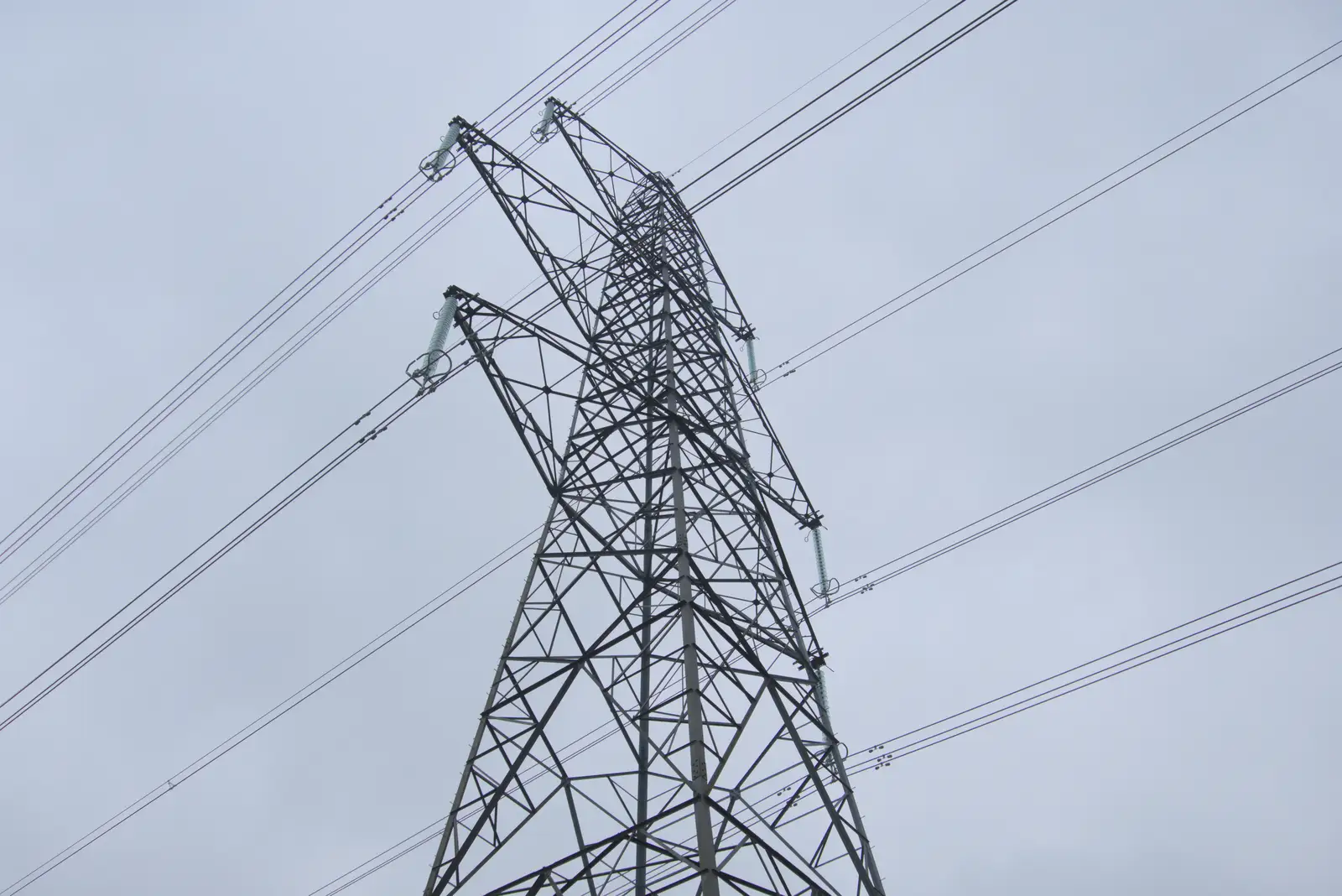 An electricity pylon looms overhead, from A Pub Walk to the Railway Tavern, Mellis, Suffolk - 9th February 2025