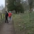 Harry looks back as we walk through the churchyard, A Return to Chagford, Devon - 16th February 2025