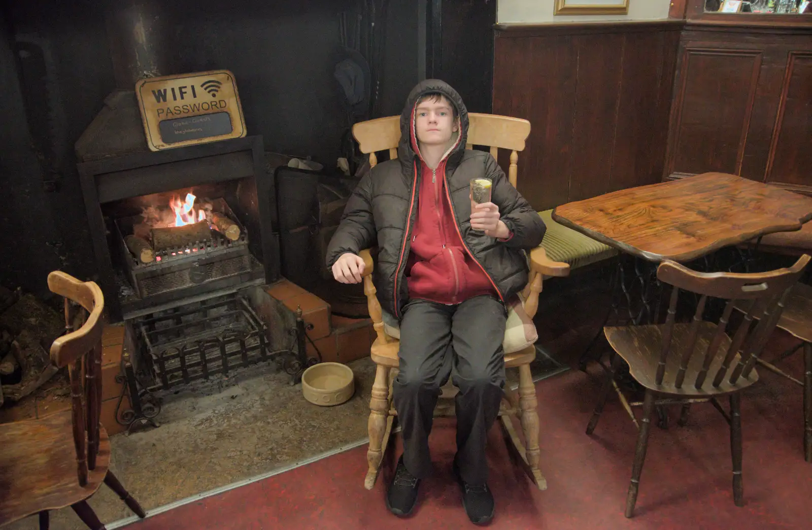 Harry sits in a rocking chair and glowers, from A Return to Chagford, Devon - 16th February 2025