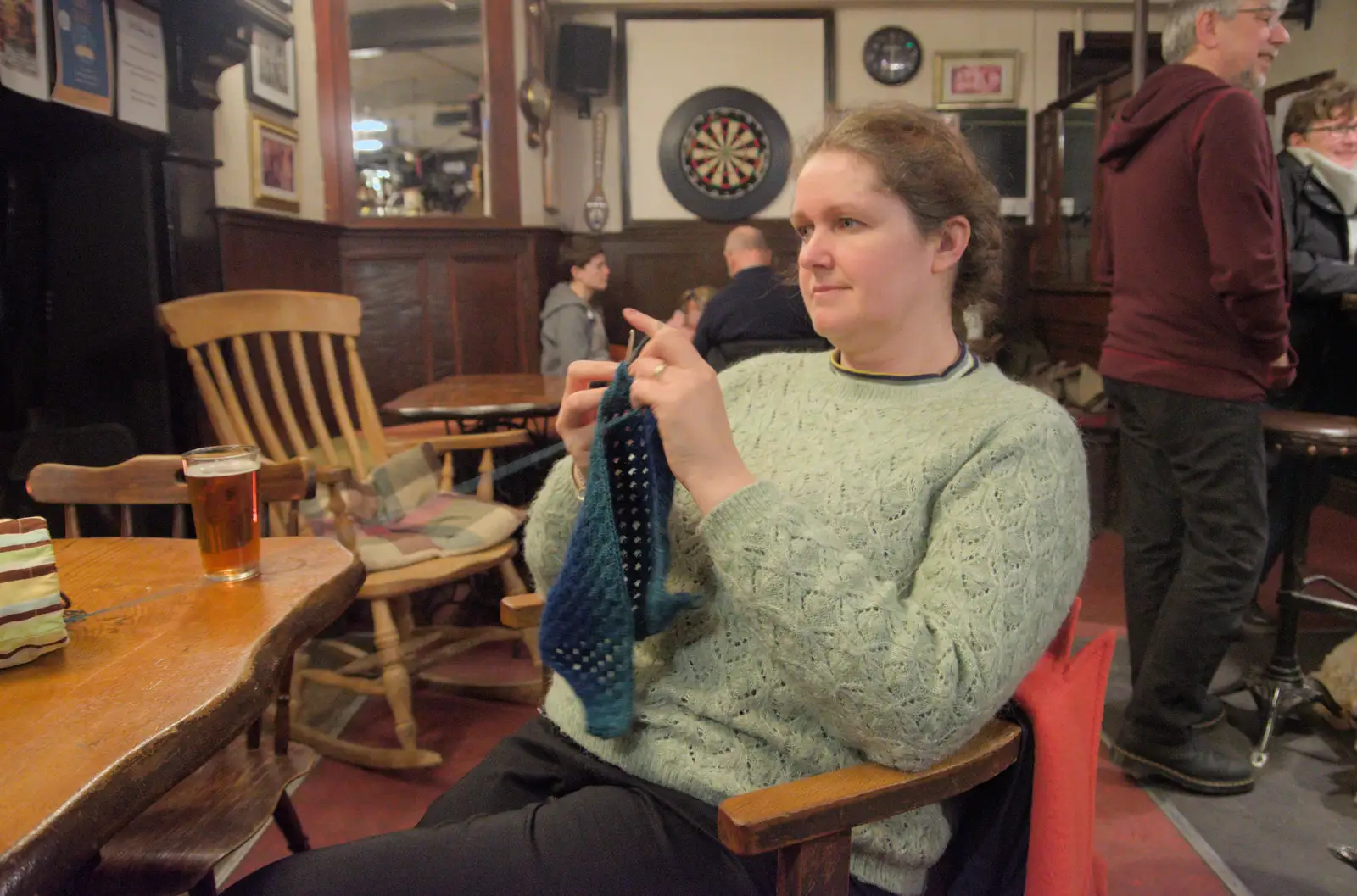 Isobel carries on with the crochet triangle, from A Return to Chagford, Devon - 16th February 2025