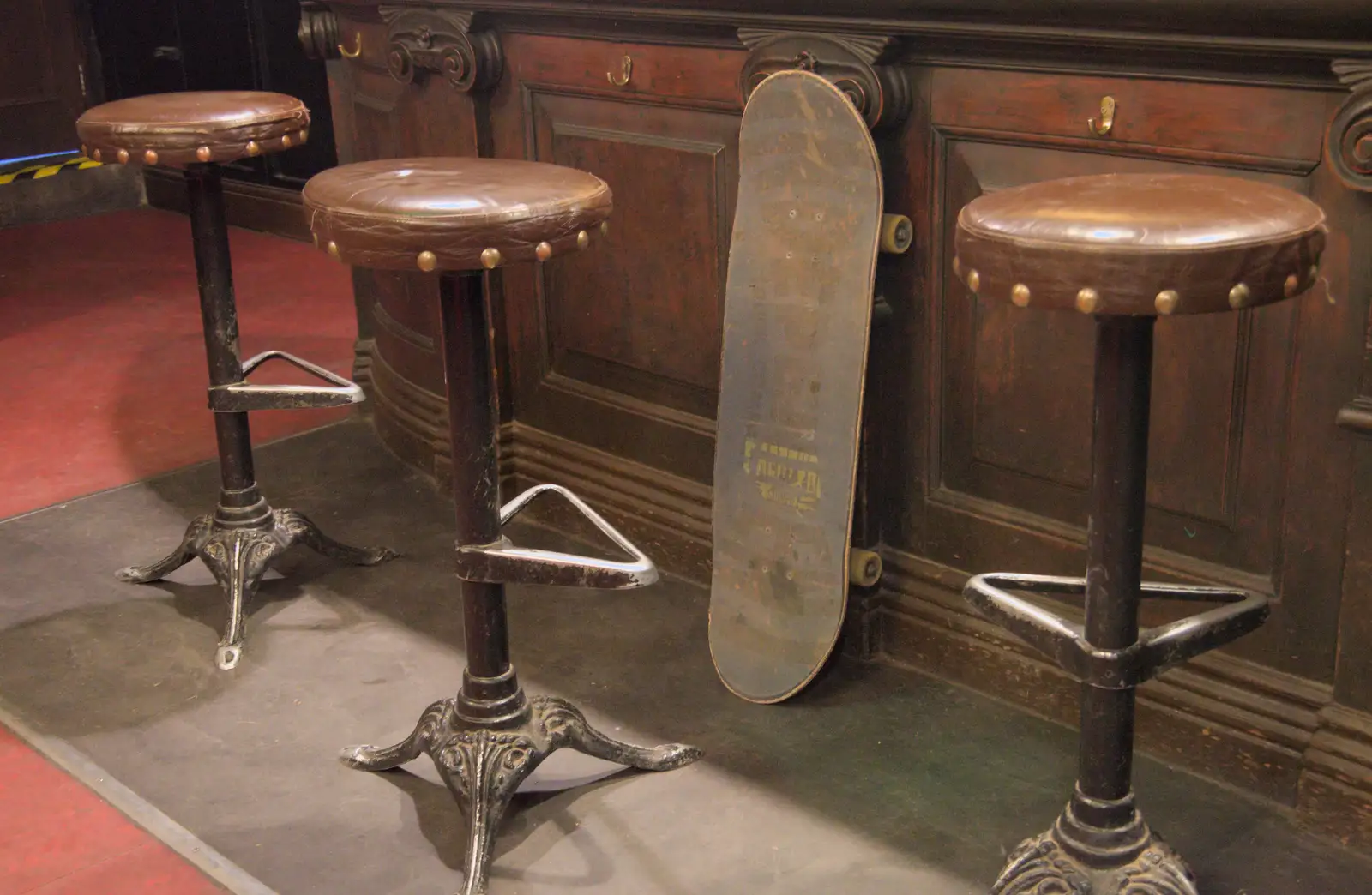 Someone's left a skateboard leaning up on the bar, from A Return to Chagford, Devon - 16th February 2025