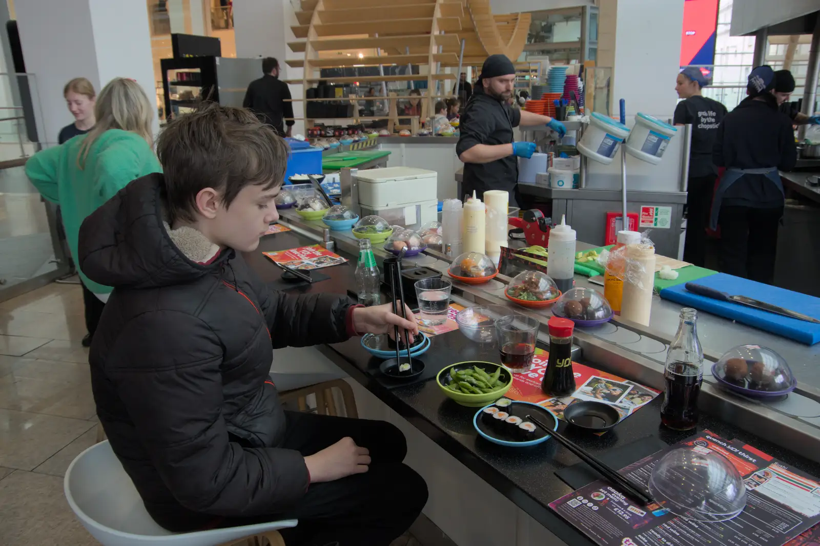 Harry in Yo! Sushi, Drake Circus, from Uni: A Return to Plymouth Polytechnic, Devon - 17th Februry 2025