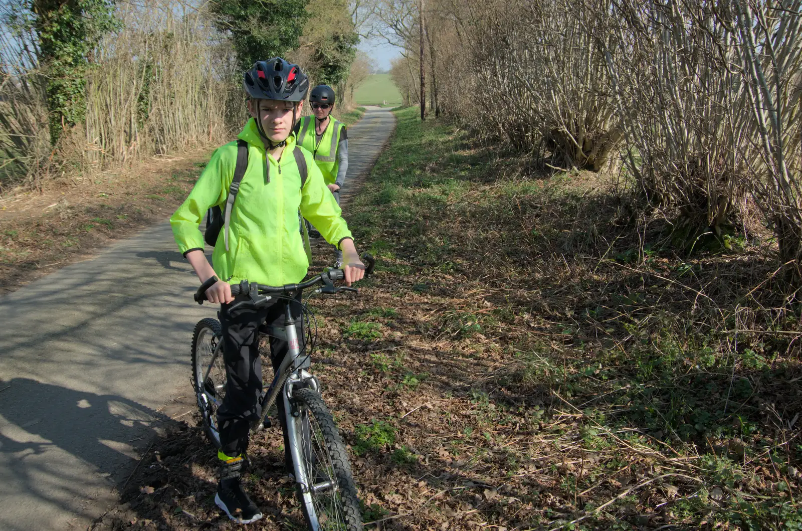 Harry and Isobel on the road to Thrandeston, from A Sunday Pub Ride, Thornham and Mellis - 9th March 2025
