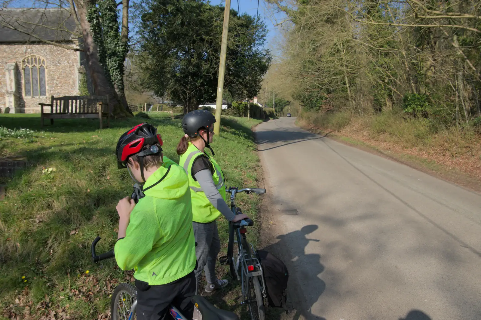 Harry stops to make adjustments in Thornham Magna, from A Sunday Pub Ride, Thornham and Mellis - 9th March 2025