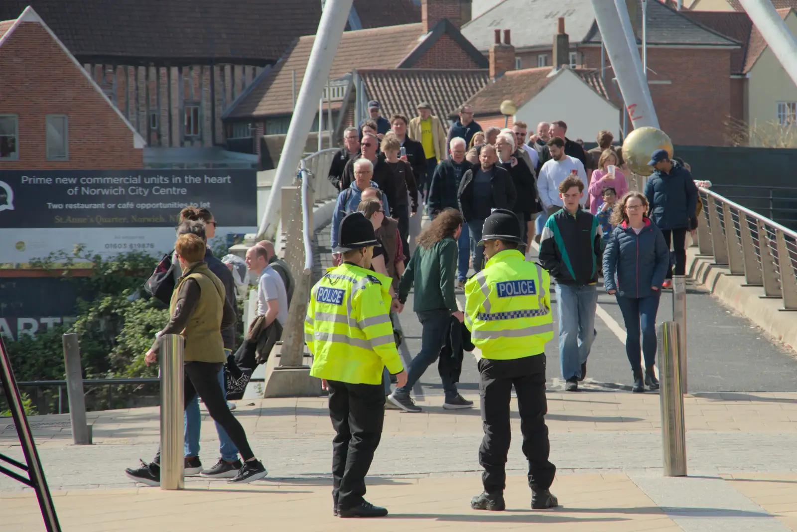Rozzers monitor the stream of football fans, from Avoiding Football in Norwich, Norfolk - 18th April 2025