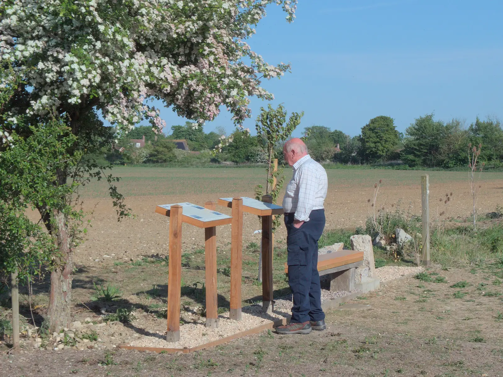 Mick the Brick checks the memorial on the airfield, from The BSCC at the Greyhound, Botesdale, Norfolk - 15th May 2025