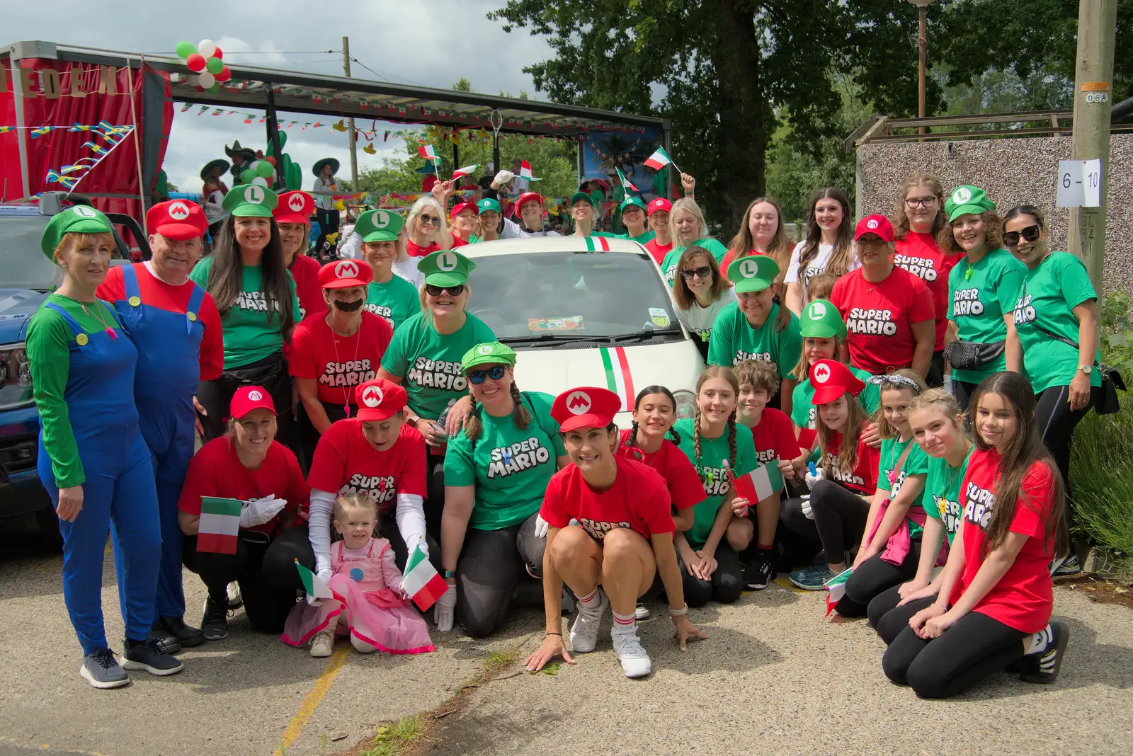 Tribe All Dance Group is dressed as Mario, from Palgrave Players do the Carnival, Diss, Norfolk - 8th June 2025
