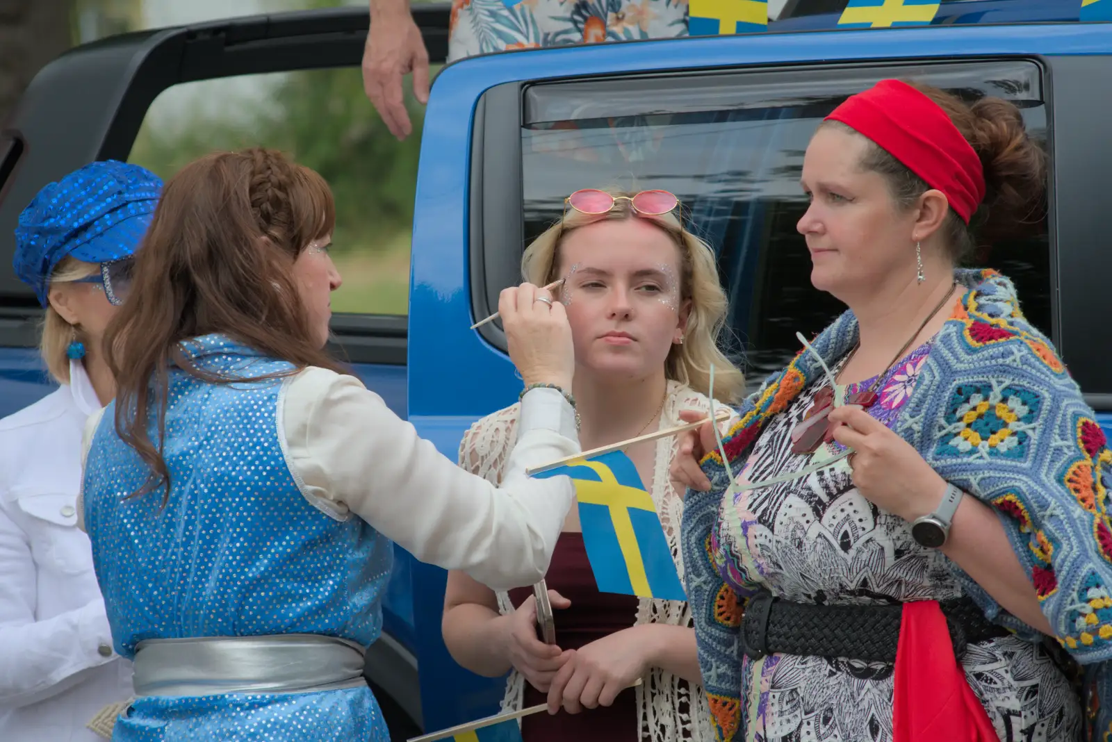 Suzanne does some face painting, from Palgrave Players do the Carnival, Diss, Norfolk - 8th June 2025