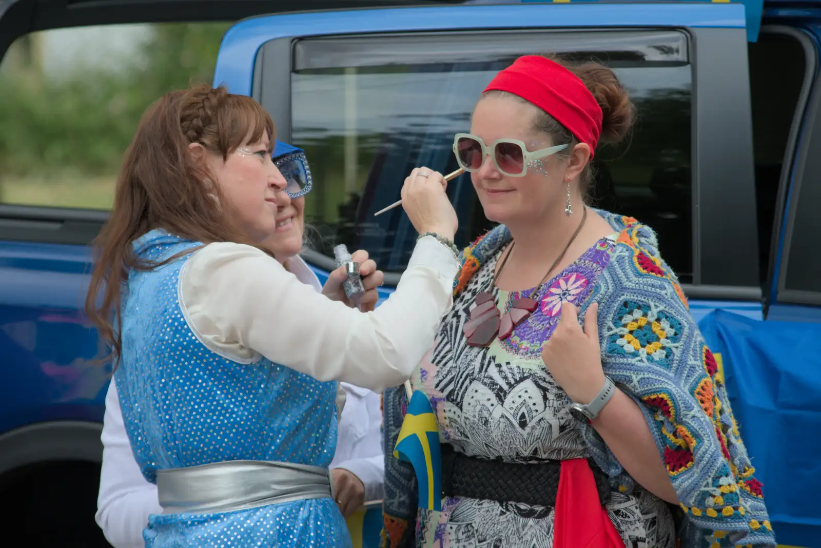 It's Isobel's turn for face painting, from Palgrave Players do the Carnival, Diss, Norfolk - 8th June 2025