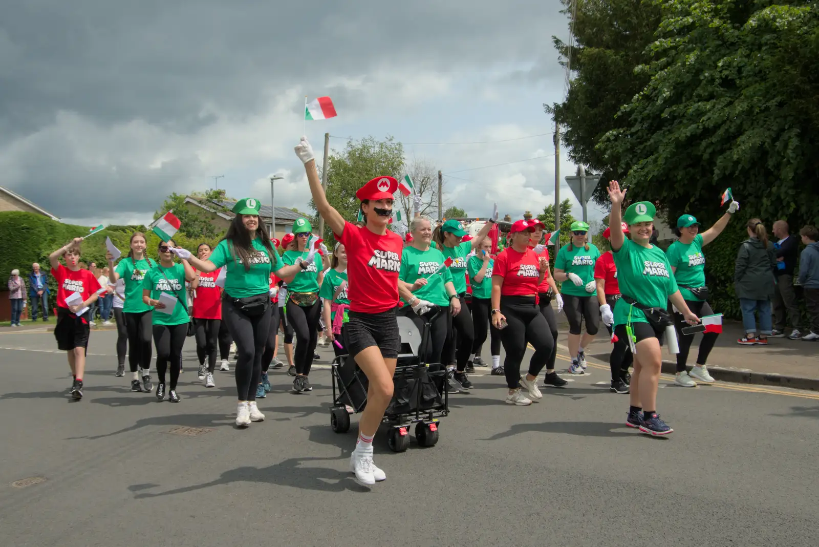 The Super Mario group heads down Mount Street, from Palgrave Players do the Carnival, Diss, Norfolk - 8th June 2025