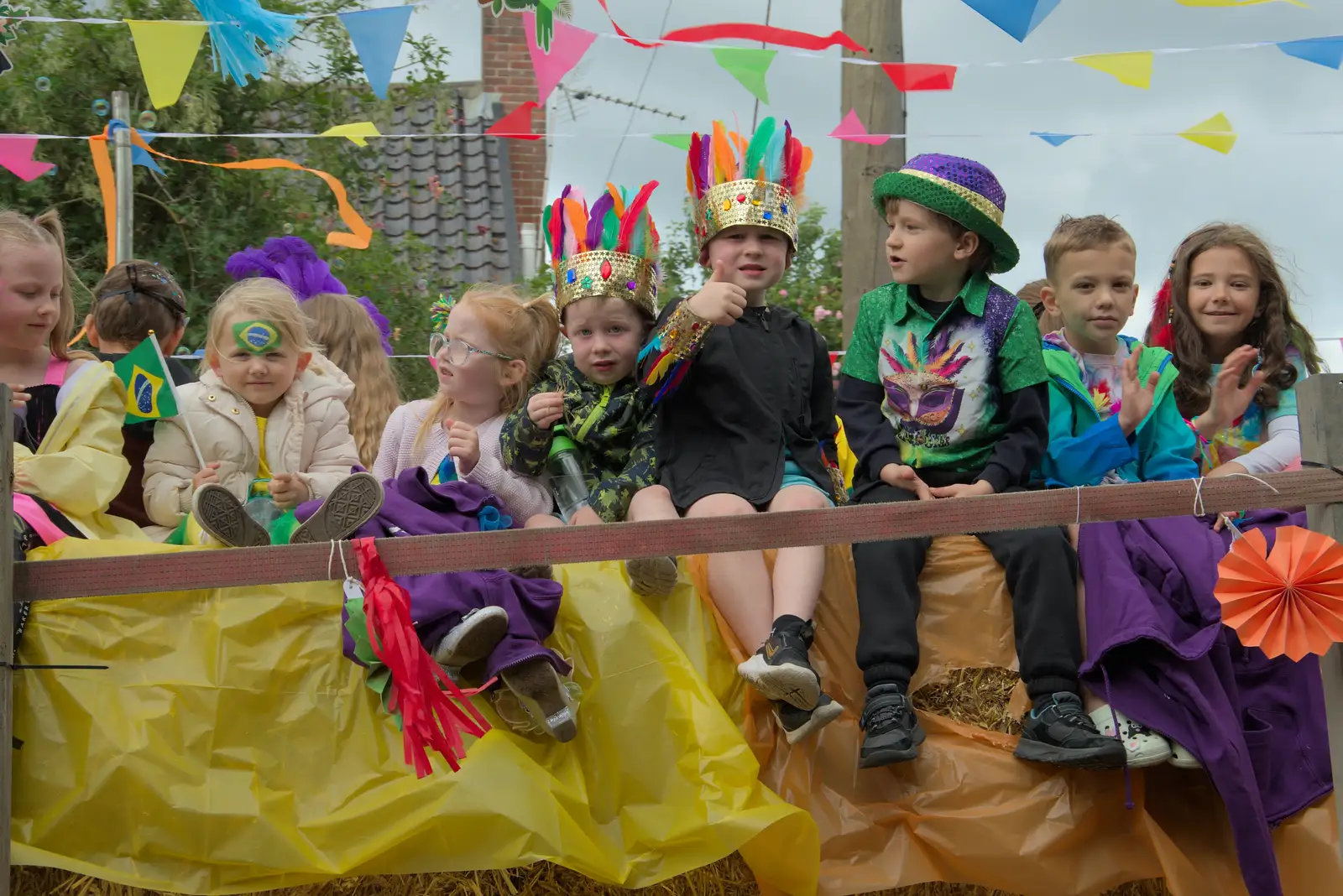 Thumbs up from some school kids, from Palgrave Players do the Carnival, Diss, Norfolk - 8th June 2025
