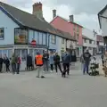 A string of spectators outside Brownes, Palgrave Players do the Carnival, Diss, Norfolk - 8th June 2025