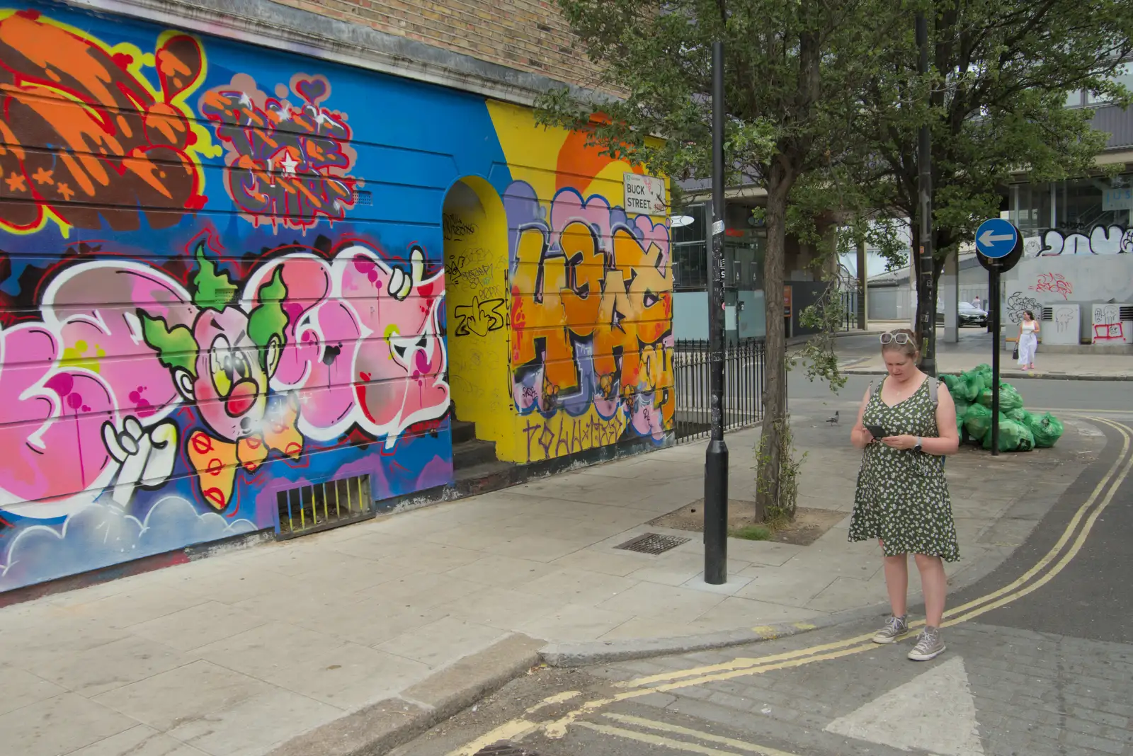 Isobel checks directions on Buck Street, from The Sunday Seisiún at the London Irish Centre, Camden Town - 22nd June 2025