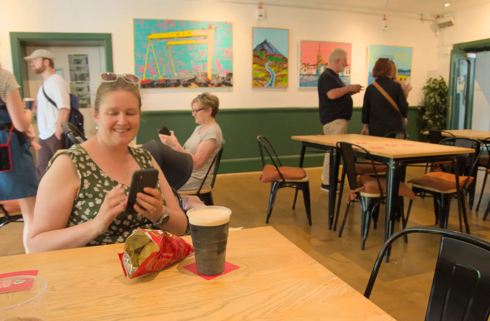 Isobel has a Guiness Zero and a bag of crisps, from The Sunday Seisiún at the London Irish Centre, Camden Town - 22nd June 2025