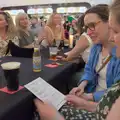 We check the Paddy Wok menu with Caoimhe the Shoe, The Sunday Seisiún at the London Irish Centre, Camden Town - 22nd June 2025