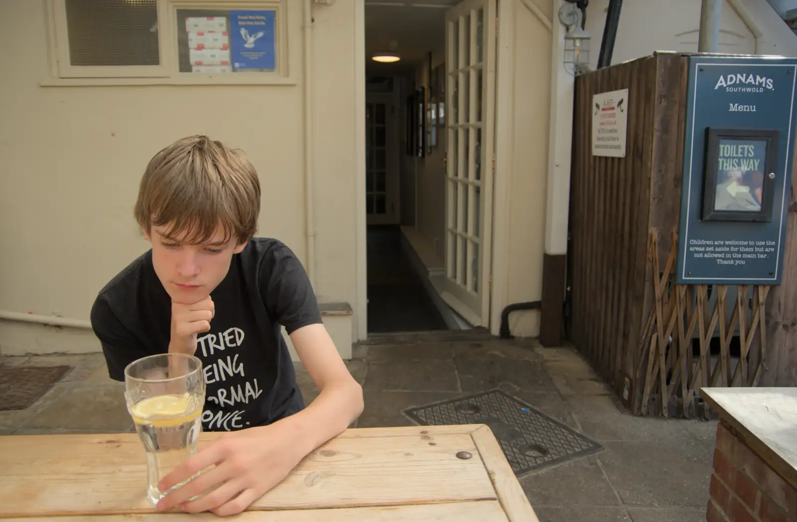 Harry ponders his lemonade, from Harry's Karate Kamp, Blackshore, Southwold - 5th July 2025