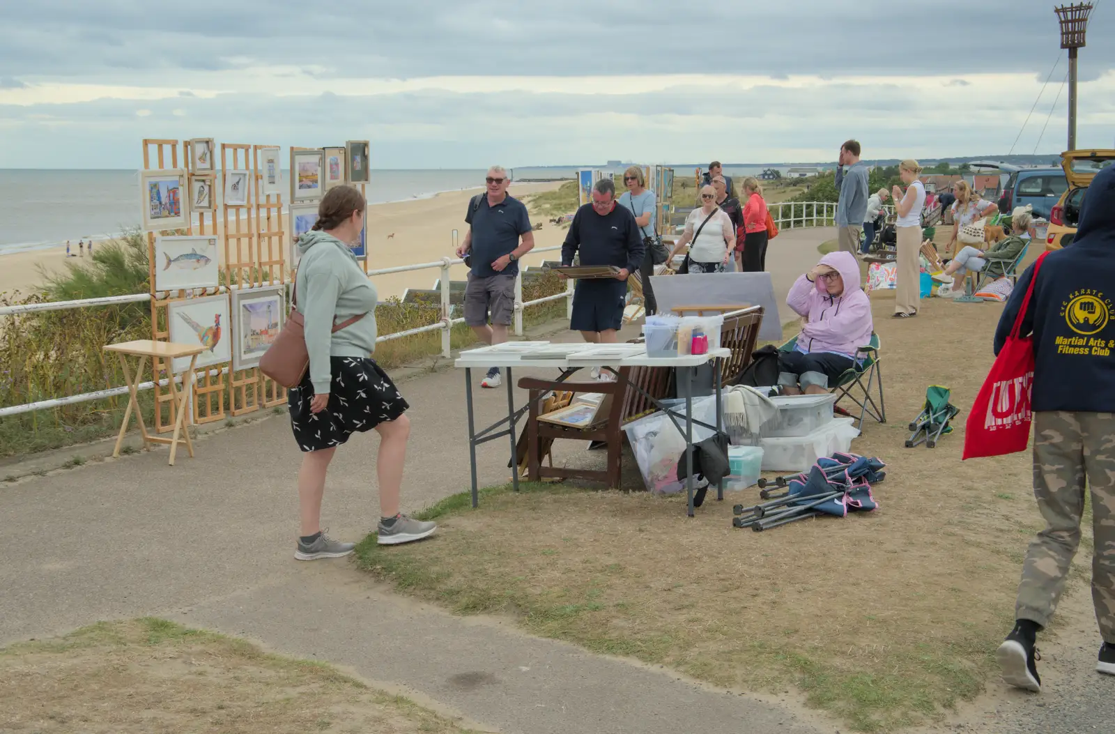 Isobel roams around the art exhibition, from Harry's Karate Kamp, Blackshore, Southwold - 5th July 2025