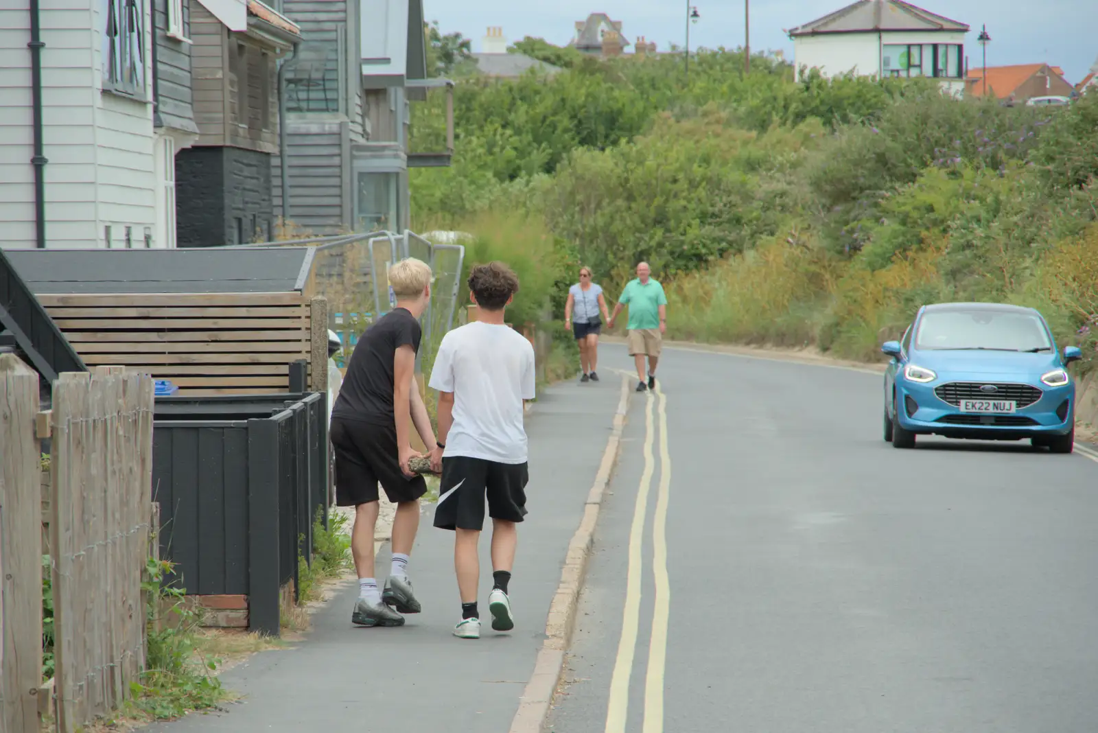 A couple of Karate lads haul a 'rock' up Ferry Road, from Harry's Karate Kamp, Blackshore, Southwold - 5th July 2025