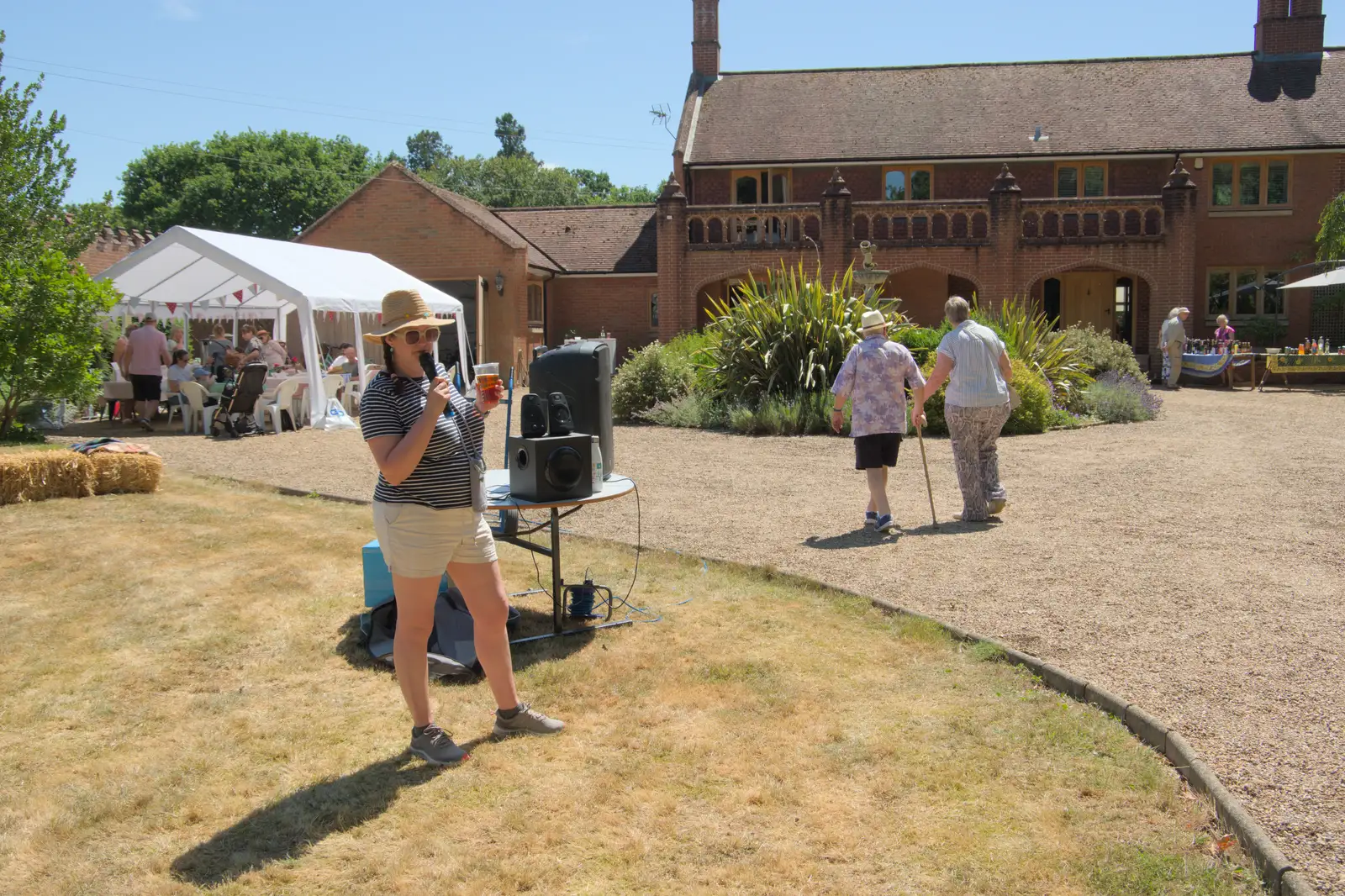 Isobel does some emceeing, from The Brome and Oakley Fete, Brome Hall, Suffolk - 12th July 2025
