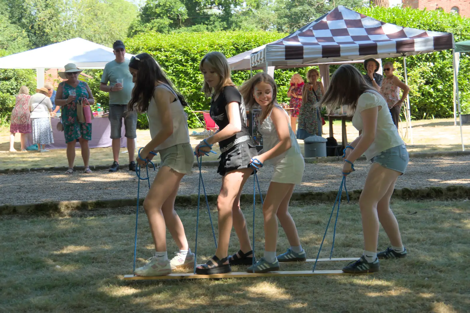 Some girls get the hang of grass skiing, from The Brome and Oakley Fete, Brome Hall, Suffolk - 12th July 2025