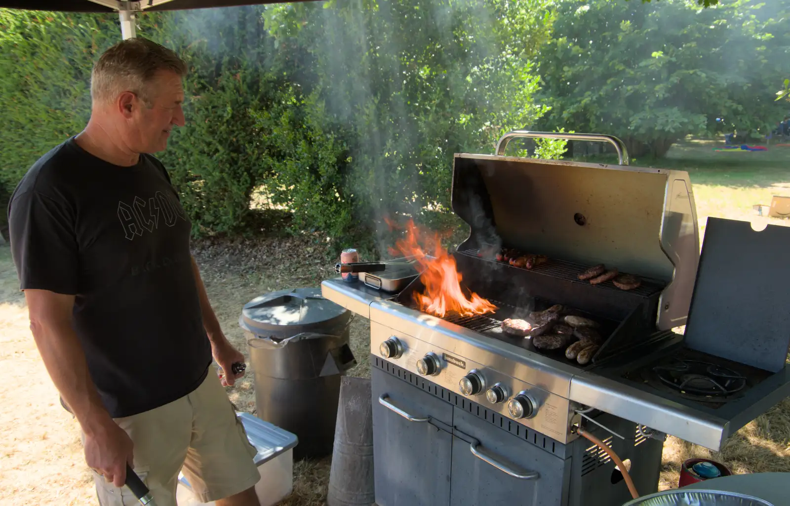 The barbeque is actually on fire, from The Brome and Oakley Fete, Brome Hall, Suffolk - 12th July 2025