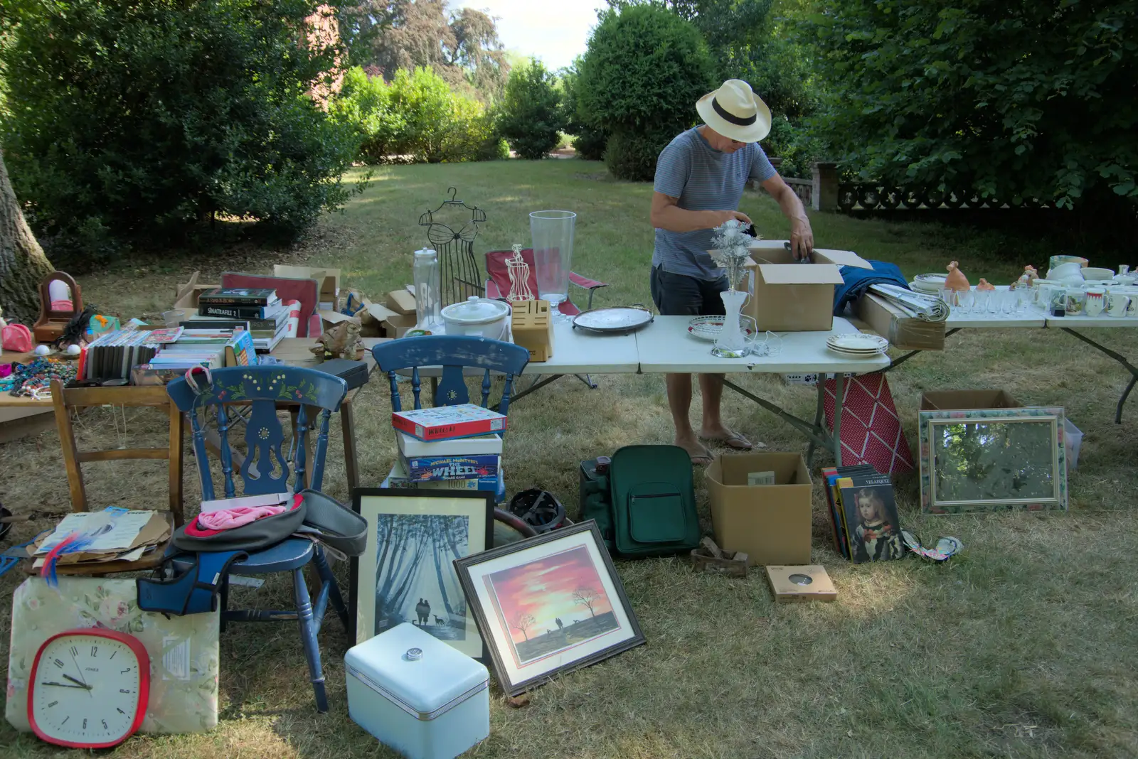 Tim packs up the bric-a-brac stall, from The Brome and Oakley Fete, Brome Hall, Suffolk - 12th July 2025
