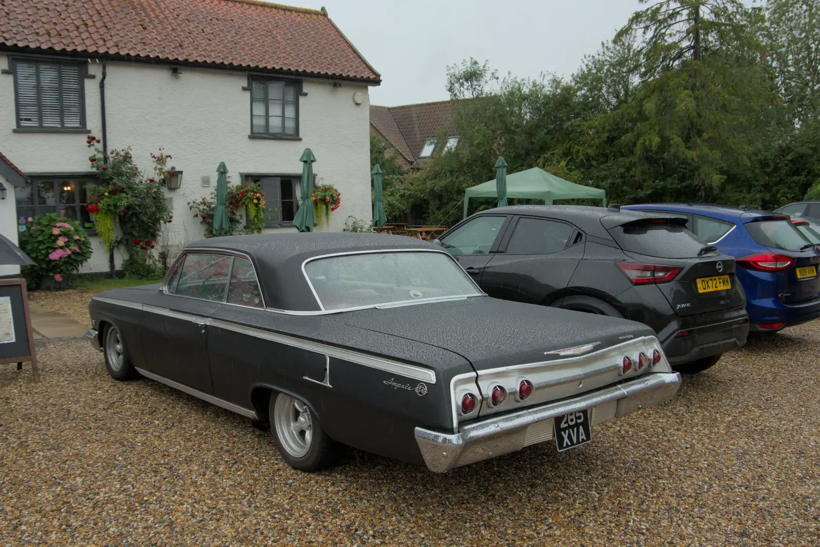 There's a cool 6.4 Chevy Impala outside the pub, from A Wet Walk to the Black Horse, Thorndon, Suffolk - 20th July 2025