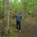 Fred whacks a tree with a thick branch, A Wet Walk to the Black Horse, Thorndon, Suffolk - 20th July 2025