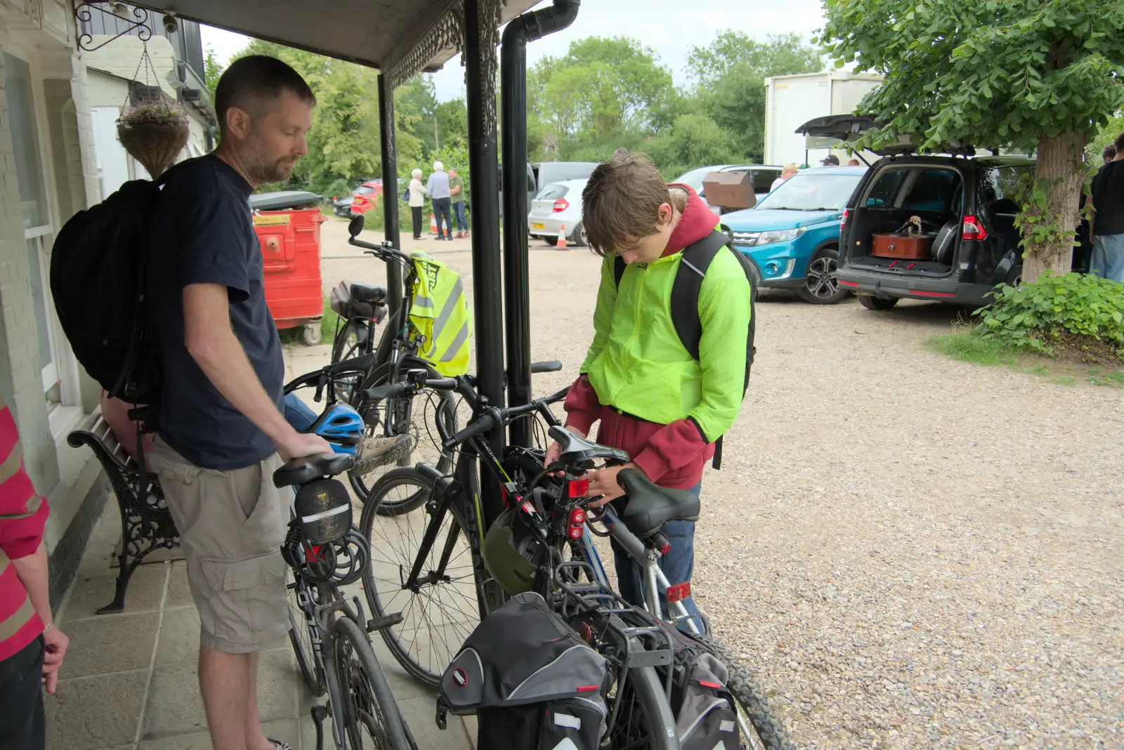 Harry unlocks the bikes, from The SYWO in Normandy, and a Mini Music Festival, Mellis - 27th July 2025
