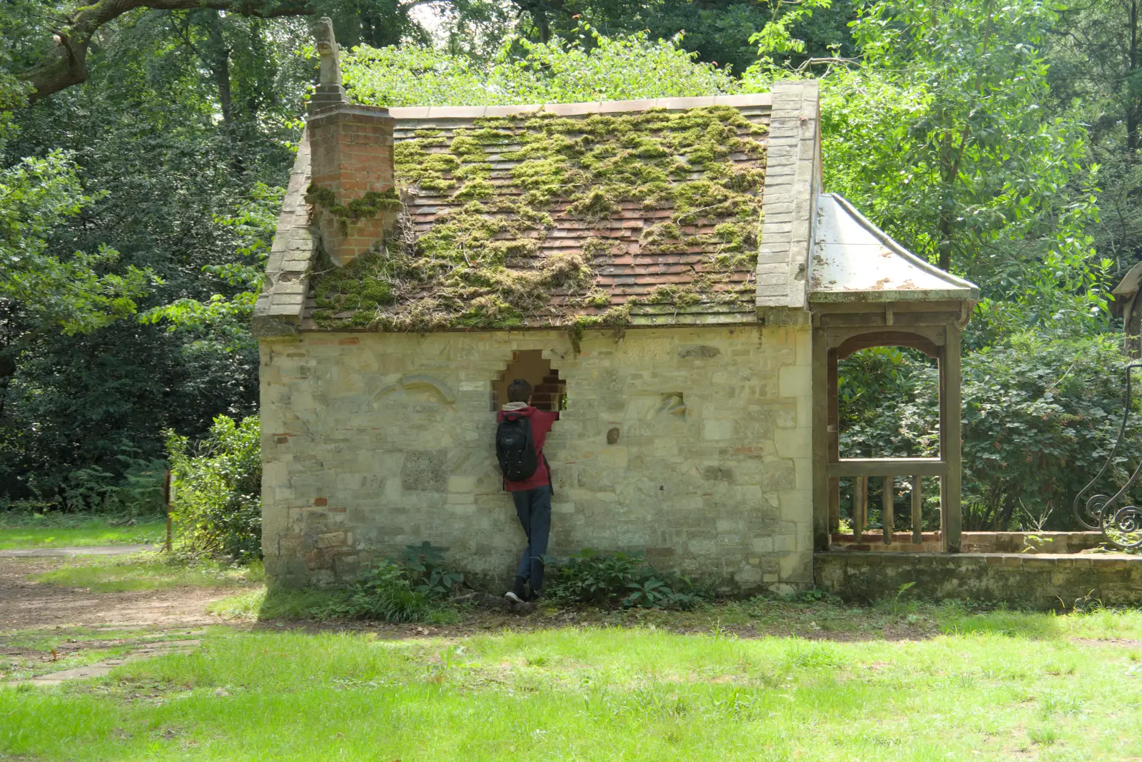Harry peers through the window of the folly, from A Visit to the Thornhams, Suffolk - 3rd August 2025