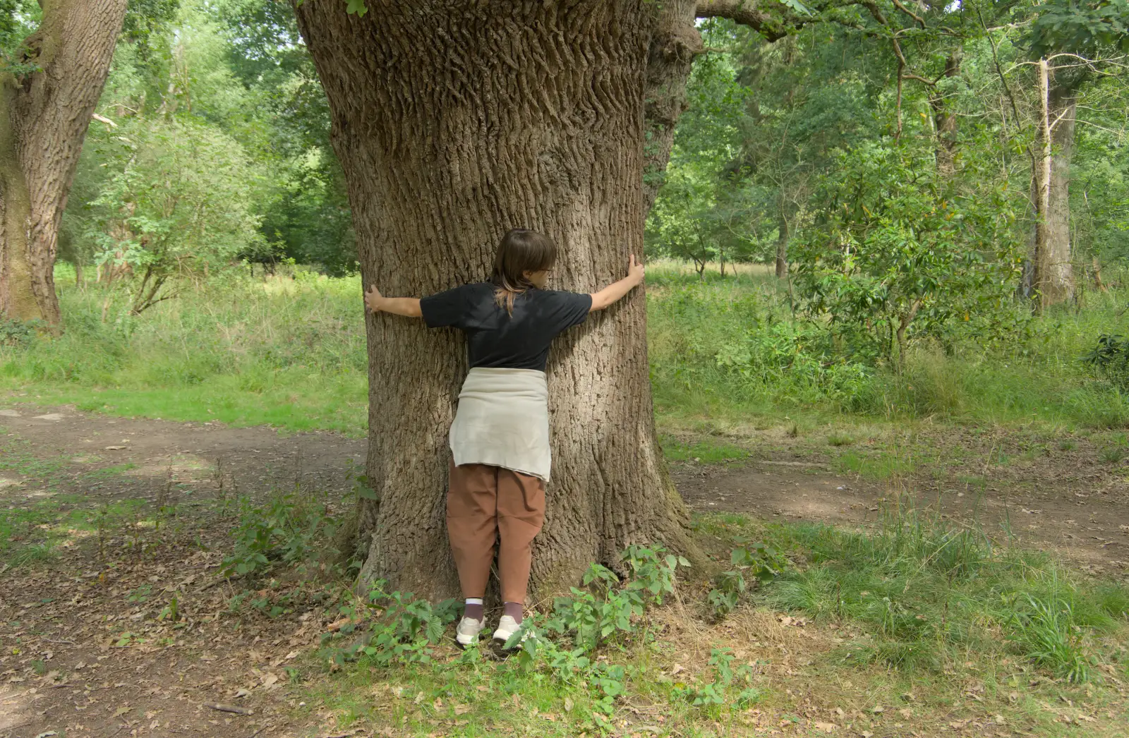 A tree is hugged, from A Visit to the Thornhams, Suffolk - 3rd August 2025