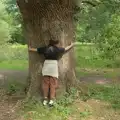 A tree is hugged, A Visit to the Thornhams, Suffolk - 3rd August 2025