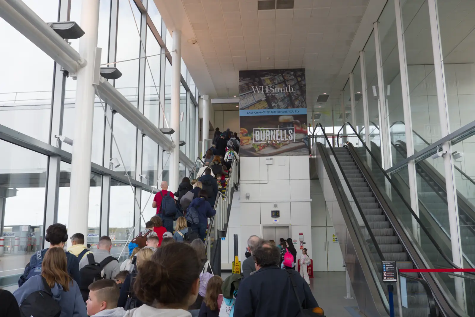 The escalator is bust so the stairs are crammed, from End of the Line 1: Dún Laoghaire to Howth, Ireland - 29th October 2025