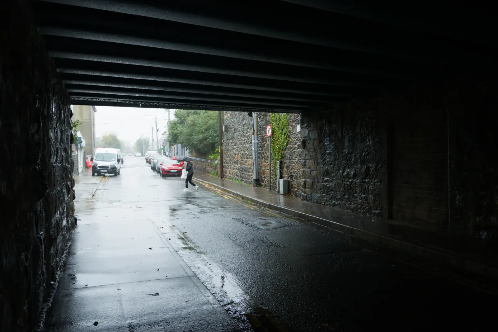 Under a railway bridge: the only dry spot in Bré, from End of the Line 2: Bré to Blackrock, County Dublin, Ireland - 1st November 2025