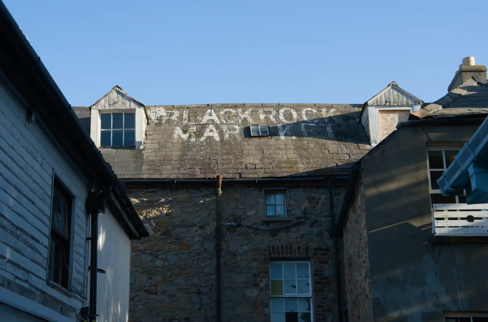 Blackrock Market painted on a roof, from End of the Line 2: Bré to Blackrock, County Dublin, Ireland - 1st November 2025