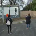 Isobel takes a photo of a Banksy-esque painting, End of the Line 2: Bré to Blackrock, County Dublin, Ireland - 1st November 2025