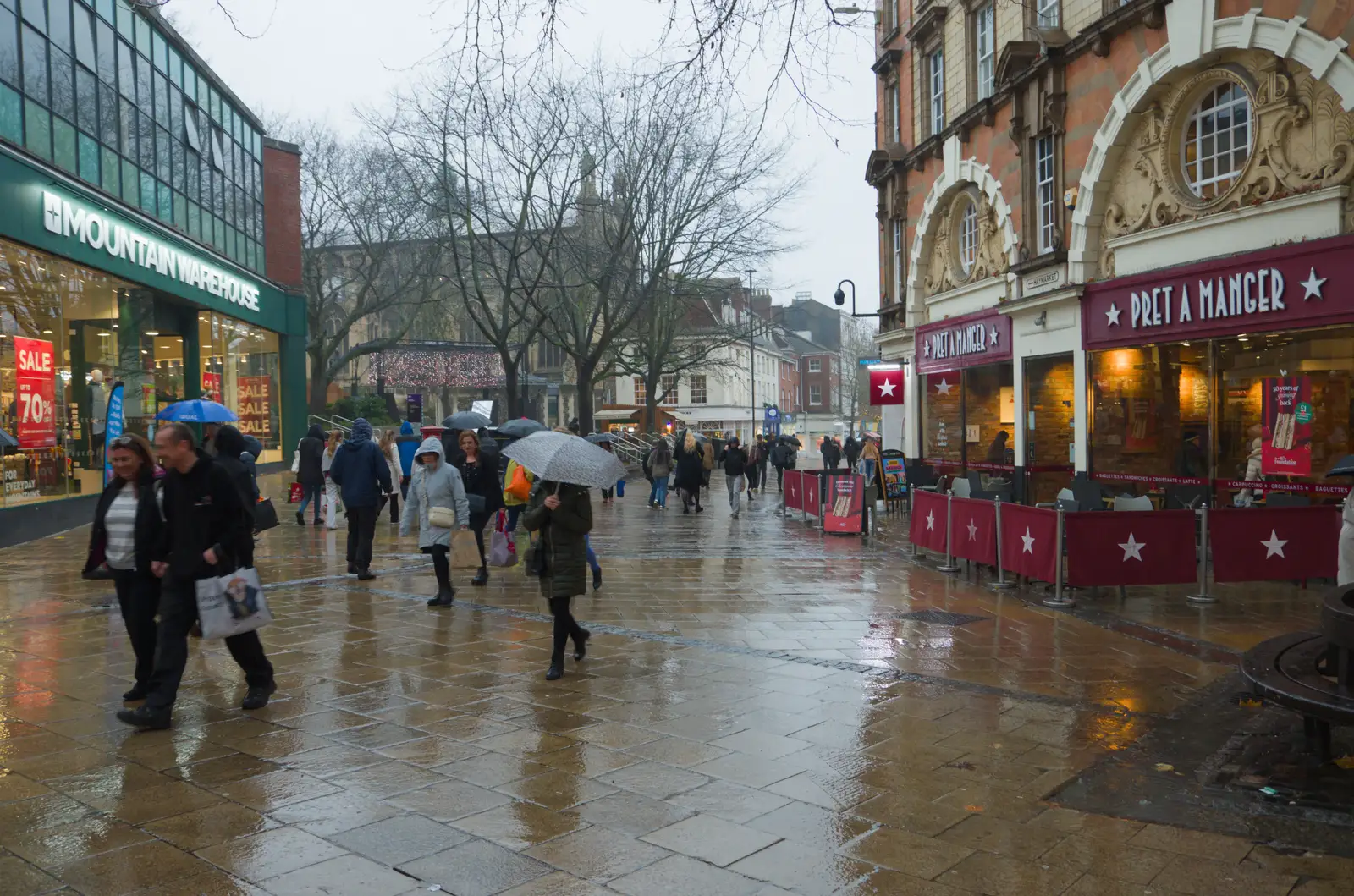 It's umbrellas all round on the Haymarket, from A Visit to St. John the Baptist Cathedral, Unthank Road, Norwich - 18th December 2025