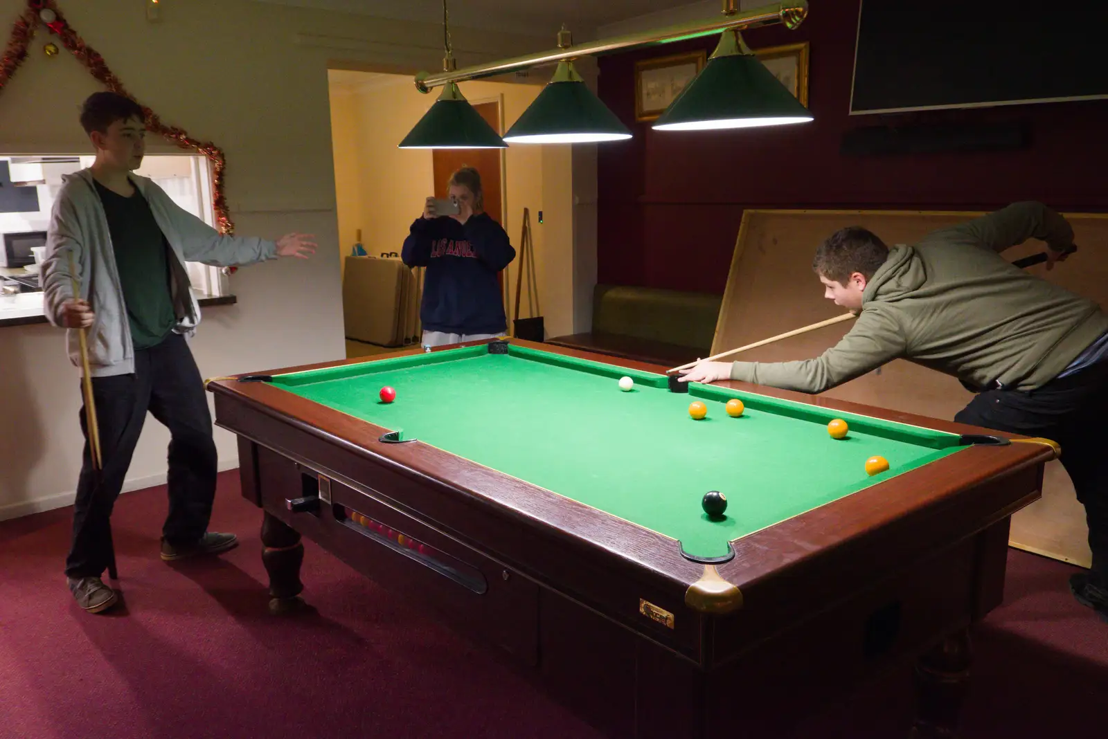 Fred does some sort of move whilst playing pool, from A Christmas Quiz and a Tractor Run, Brome, Suffolk - 20th December 2025